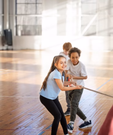 full-shot-kids-playing-tug-war-rope-game_23-2149351822